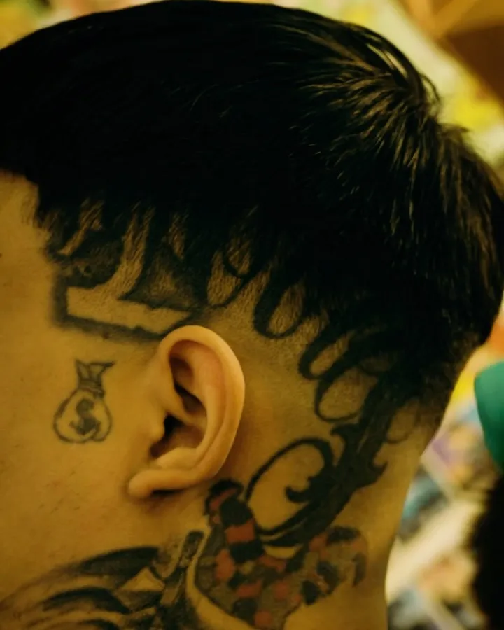 Taper en la nuca en 5.55 Barbershop